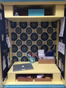 Transform an old media cabinet into a hidden desk and command center