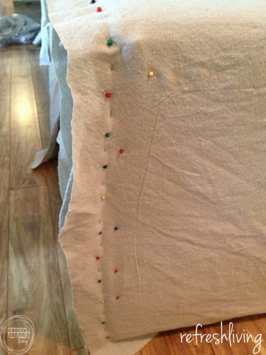 Change the look of your room by making slipcovers for your sofa. Sewing a custom slipcover for your couch is way easier than you might think. Using drop cloth material is a great way to make it a cheap project.