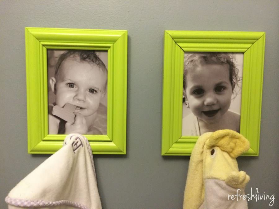 upcycle picture frames to use as kids towel hooks in the bathroom