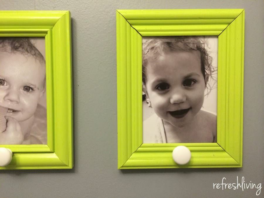 upcycle picture frames to use as kids towel hooks in the bathroom