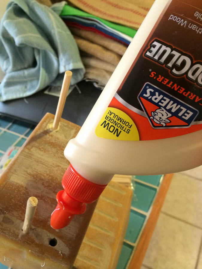 use wood dowels and wood glue to make thread organizer from old knife block