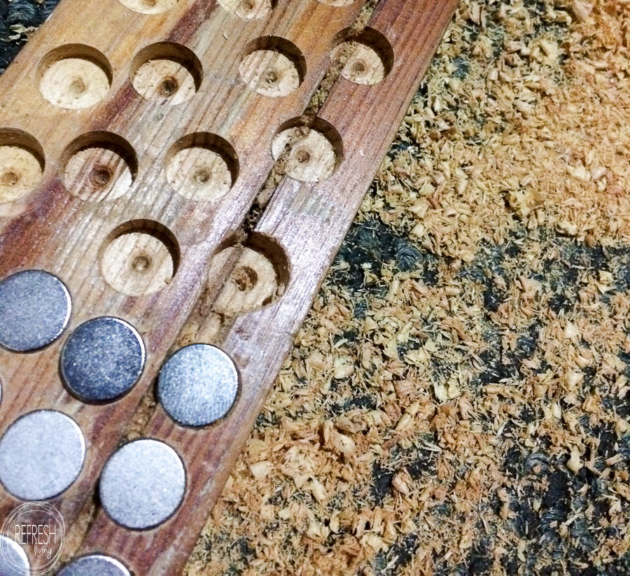 Organize your measuring cups and spoons by attaching a magnetic (knife)  strip to the i…