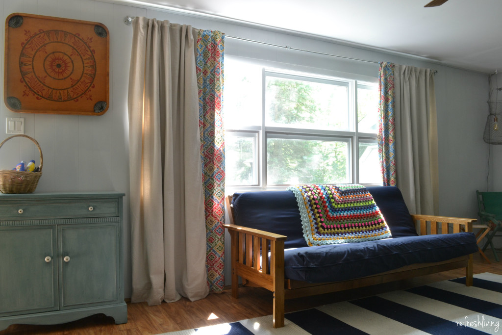 DIY drop cloth curtains with decorative fabric panel and lined for light blocking