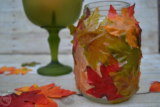 leaf covered glass jars