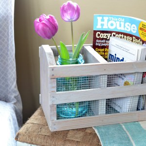 A crate from a thrift store can easily be made into a beautiful farmhouse crate with some chicken wire and a whitewash finish.