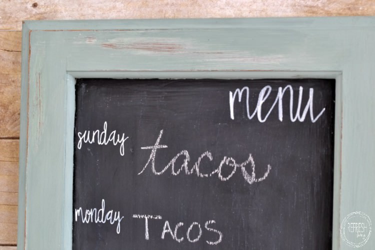 Create a chalkboard weekly menu board from an old cabinet door | Upcycled cabinet door becomes days of the week chalkboard | cheap and easy DIY menu board