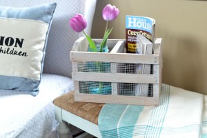A crate from a thrift store can easily be made into a beautiful farmhouse crate with some chicken wire and a whitewash finish.