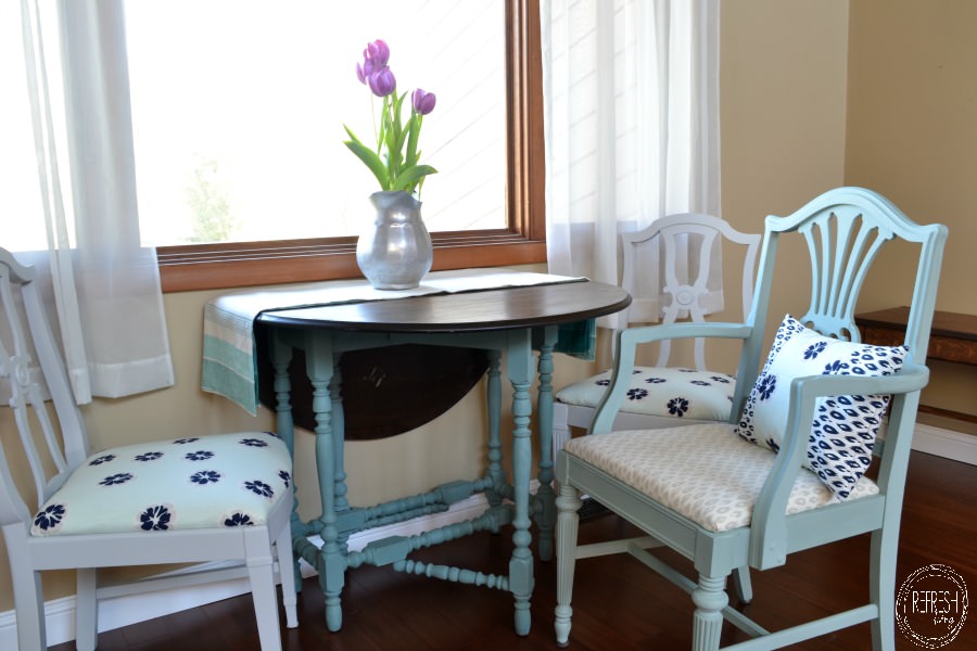 blue and gray dining chairs with coordinating fabric