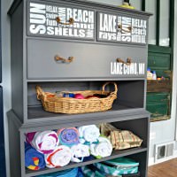 What can you do with a dresser without drawers? What a great idea to create a refinished dresser without drawers into storage for beach supplies! This would be great at a lake house or beach house.