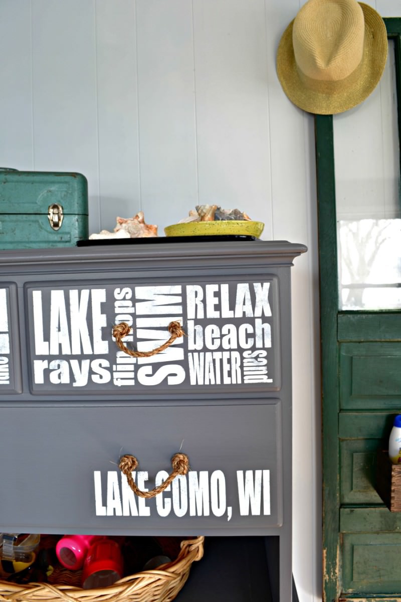 What can you do with a dresser without drawers? What a great idea to create a refinished dresser without drawers into storage for beach supplies! This would be great at a lake house or beach house. The subway lettering is a perfect way to customize it.