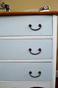 Antique dresser painted with white and turquoise with a natural wood top | two toned dresser refinish