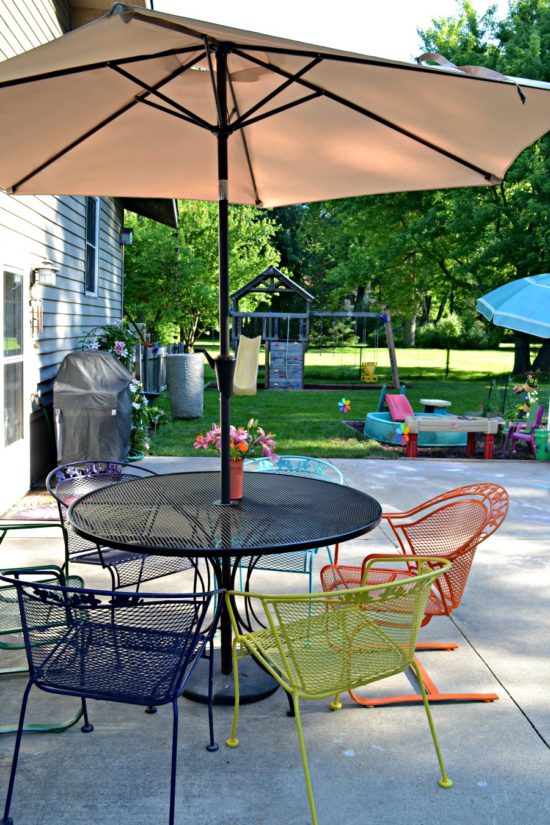 Create a backyard on a budget by painting a used patio set