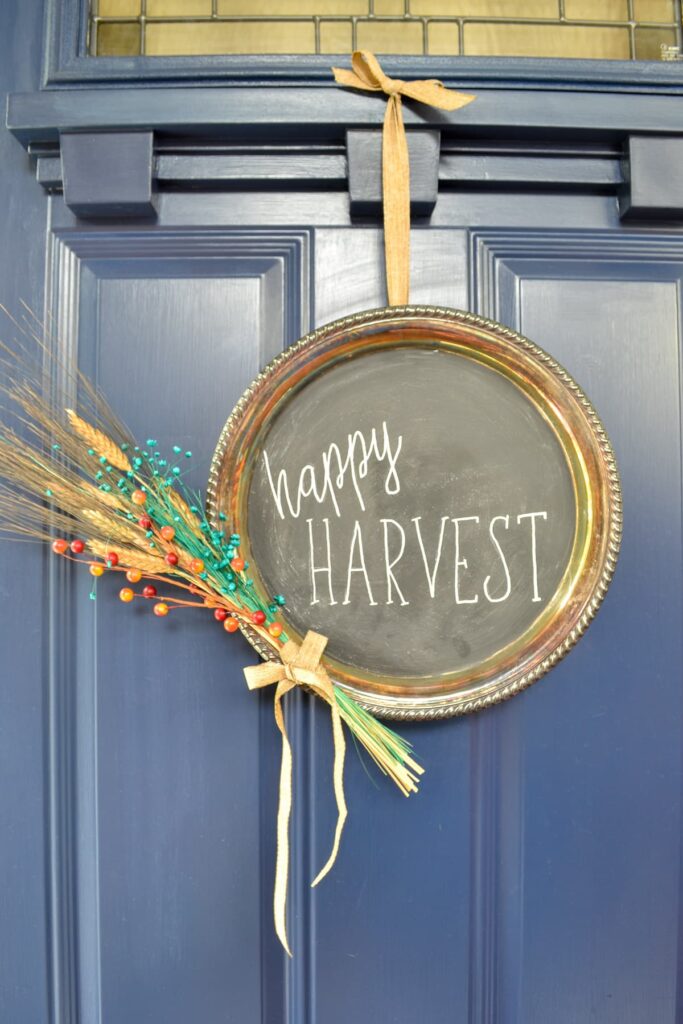 fall wreath idea for front door made with chalkboard paint and old silver platter from the thrift store with dried florals
