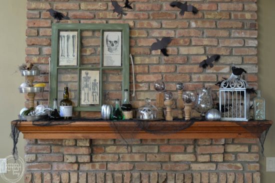 I love this spooky Halloween mantel with vintage thrift store finds and printable images, DIY Halloween decor, and dollar store items. It has an eerie factor without the traditional ghosts and witches.