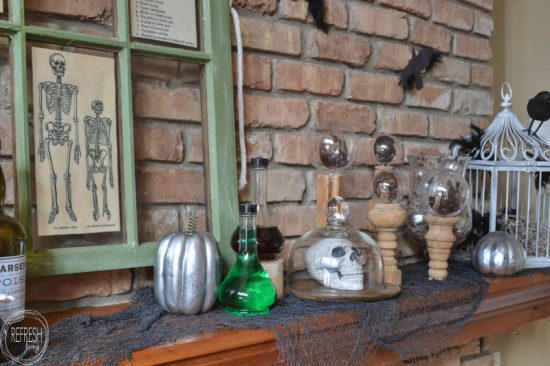 I love this spooky Halloween mantel with vintage thrift store finds and printable images, DIY Halloween decor, and dollar store items. It has an eerie factor without the traditional ghosts and witches.