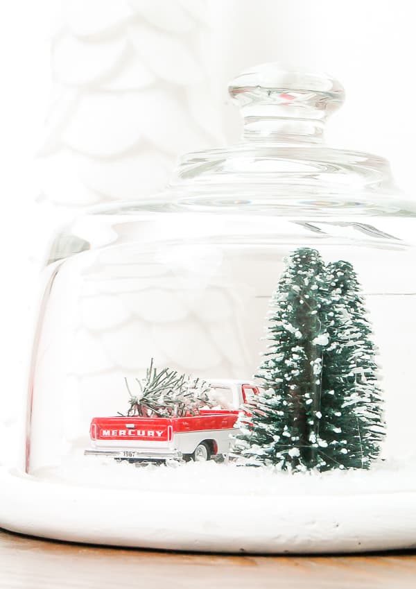 christmas scene in a cheese cloche for upcycled christmas decorations ideas