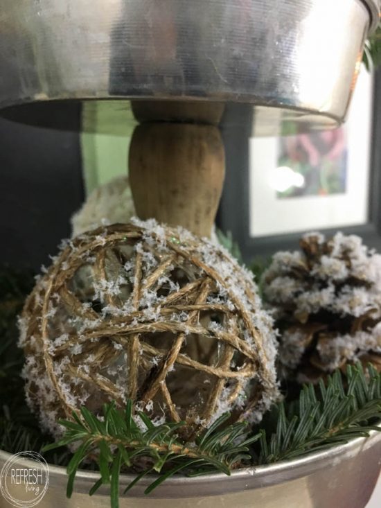 Wrapping twine around water balloons create the perfect shaped rustic twine or string balls to use an fillers for centerpieces or holiday decor.