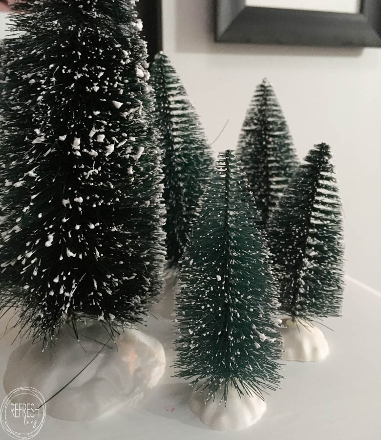 This post has tons of ideas on how to use bottle brush trees in Christmas decor!