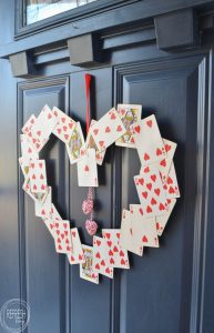 What an easy wreath for Valentine's Day! Now I know not to throw away incomplete decks - I can save the heart cards for this!!