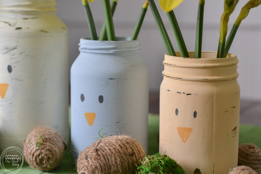 Upcycled glass food jars for Spring decorations. Chalk paint on glass jars that can be washed in the dishwasher.