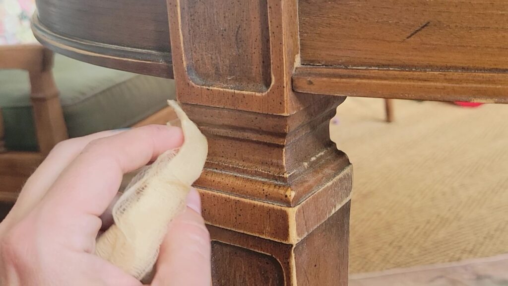 use a tack cloth after sanding to remove sanding dust before painting furniture