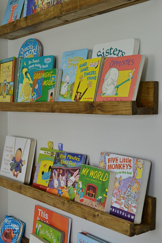 What a great use of unused space behind a door! Add book ledges to store books or small toys.