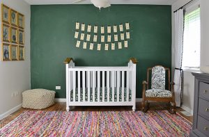 This nursery is filled with fun vintage finds to create a modern spin on a vintage classroom. I love the green chalkboard wall!