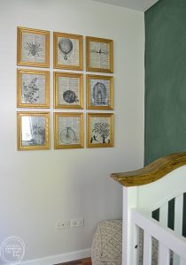 Large art display with individual frames with dictionary page art and printed vintage illustrations.