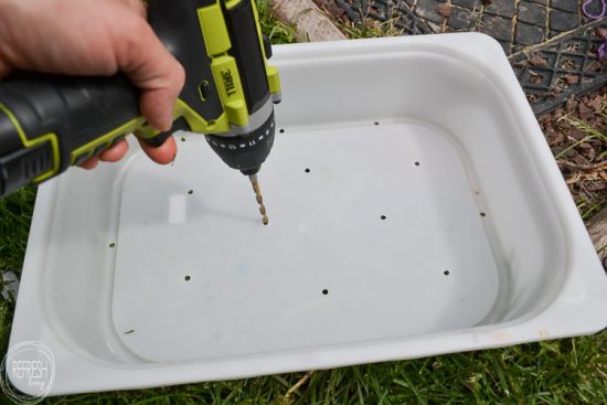 An old sofa table can be reused as a DIY raised garden bed! This is such an easy outdoor project!