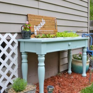 upcycle an old sofa table to make a DIY raised garden planter bed