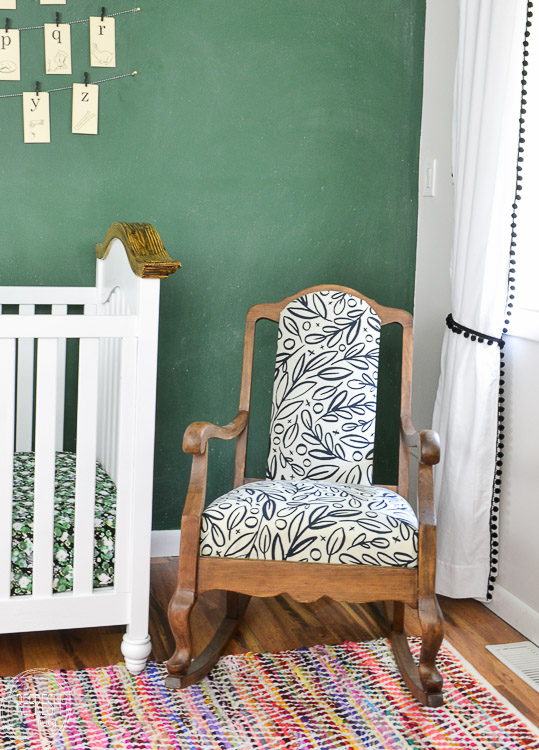 An old vintage rocking chair gets a new look with stripped wood and a modern black and white fabric.