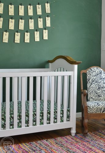 An old vintage rocking chair gets a new look with stripped wood and a modern black and white fabric.