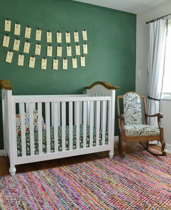 An old vintage rocking chair gets a new look with stripped wood and a modern black and white fabric.