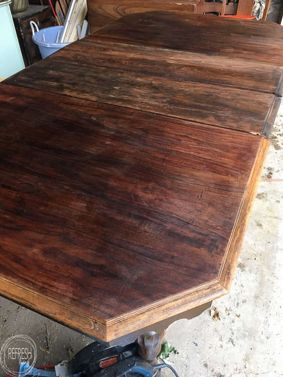 Tips and tricks for stripping wood furniture. This vintage dining table only cost $37, but with some time and effort, it has been turned into a beautiful piece of furniture. 