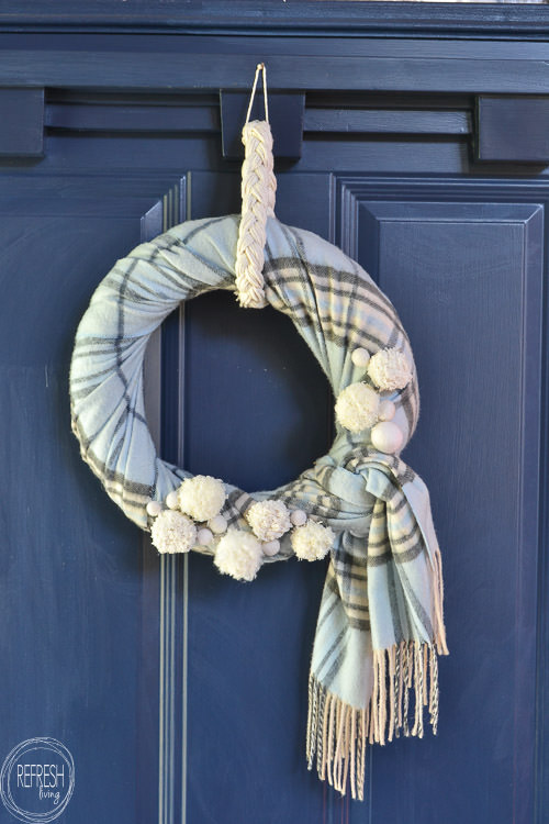 Reuse an old scarf and make it into a winter wreath that can stay up well past Christmas! DIY wreath via Refresh Living