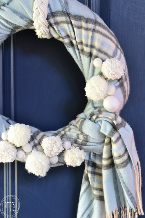 Reuse an old scarf and make it into a winter wreath that can stay up well past Christmas! DIY wreath via Refresh Living