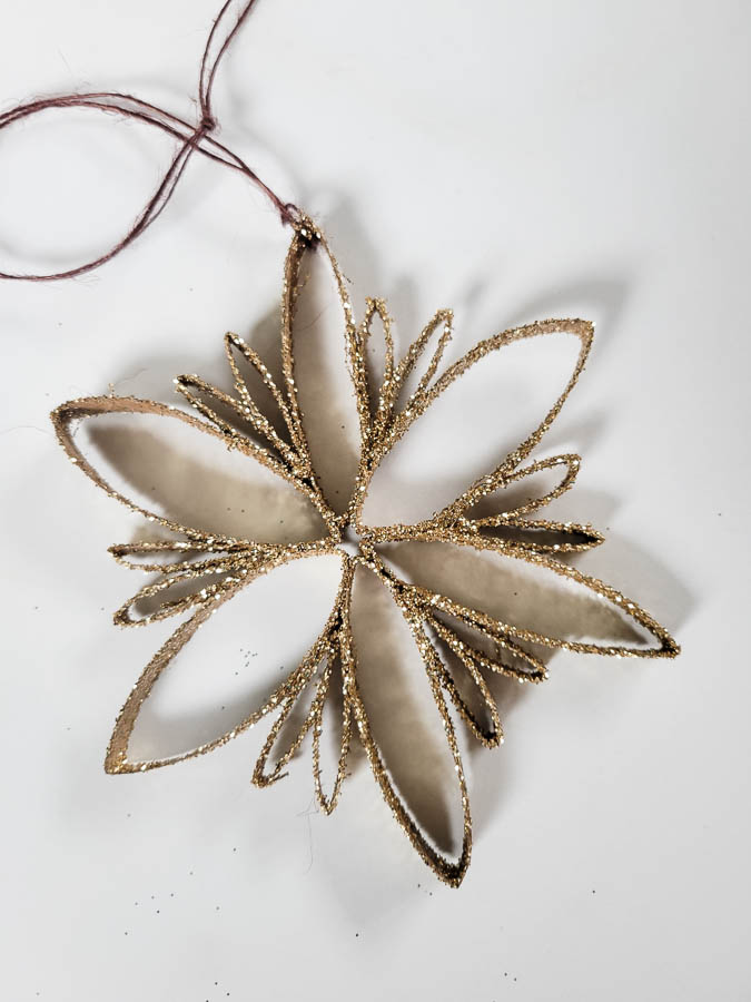 easy and cheap snowflake ornament from toilet paper roll