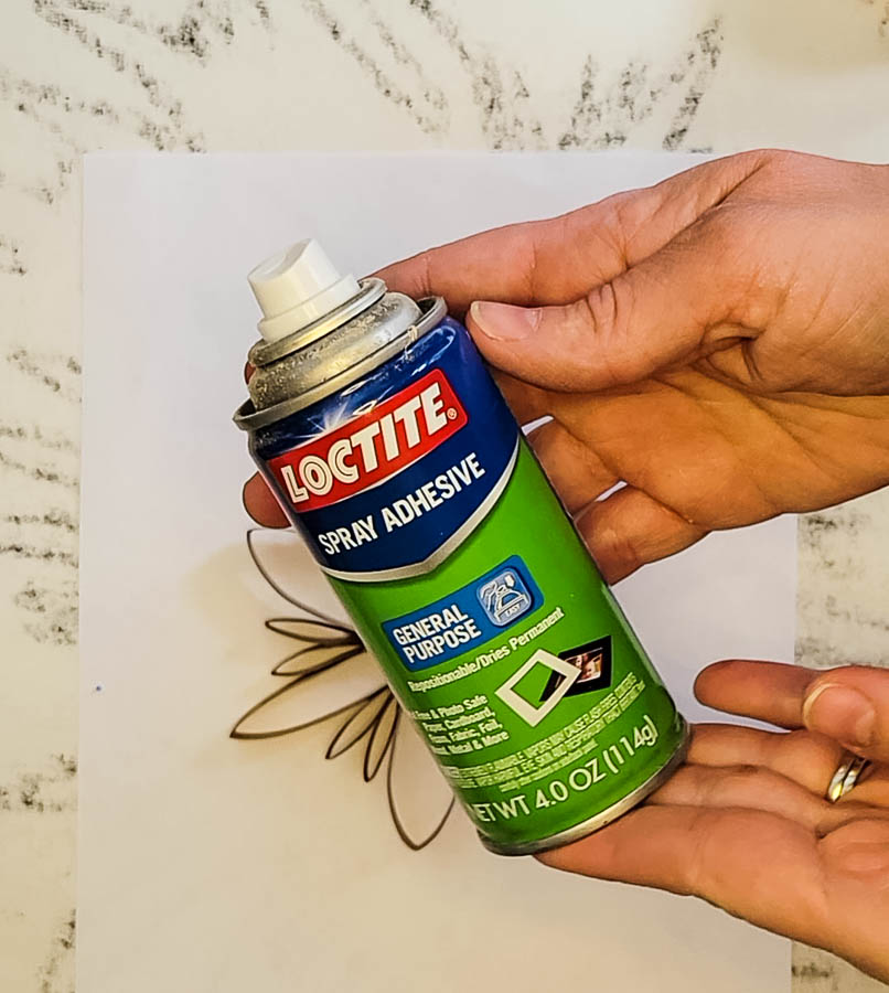 spray adhesive to attach glitter