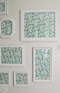 This is definitely what I need! I'm too afraid of commitment to put up wallpaper, so this is the perfect alternative. Use thrift store and second hand picture frames to create a gallery wall with wallpaper or patterned paper from Refresh Living.