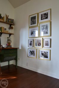 I can't believe this gold gallery wall is made from second hand frames and cost less than $20! Black and white photos in gold frame gallery wall via Refresh Living