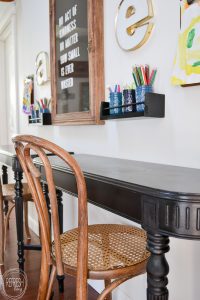 Take an old table and cut off the ends to make wall desks - such a great idea! These would be perfect for kids without taking up much room in the house. Vintage table turned into desks via Refresh Living.
