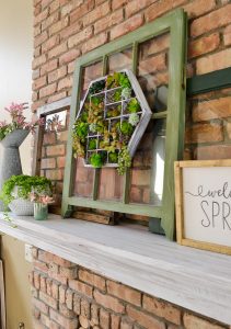 Just paint a wooden trinket case or toy box and then add in faux succulents. Easy succulent planter ideas to hang on the wall via Refresh Living.