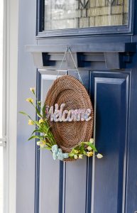 This is a great idea on how to make a inexpensive DIY spring wreath using a thrift store find. For less than $5, you can make a custom spring front door decoration!