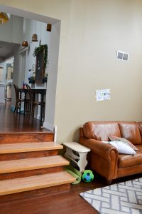 This living room needs a total update, but still needs to be family friendly. Plans for vintage modern eclectic living room on a small budget.