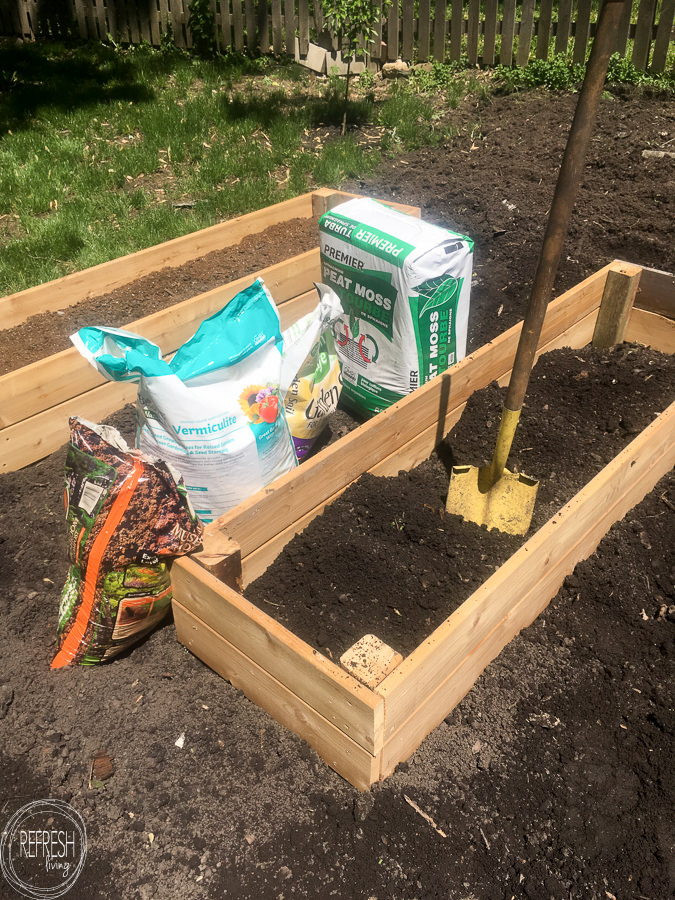 bags of soil to mix together for raised garden beds