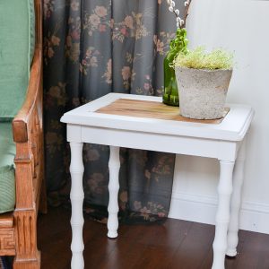 This farmhouse table painted white with wood slats used to be a table with broken caning. What a good idea on how to fix broken caning in benches and chairs.