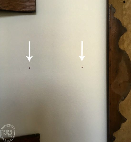 This trick for hanging objects with two brackets on the wall really works. A great way to hang picture frames and other objects level without making a ton of holes in the wall.