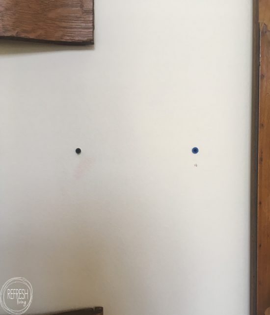 This trick for hanging objects with two brackets on the wall really works. A great way to hang picture frames and other objects level without making a ton of holes in the wall.