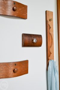 Love this idea for a coat rack for a small entryway! It's decorative and functional, and even better, it reuses old items (dresser drawer fronts) that would otherwise be thrown away.