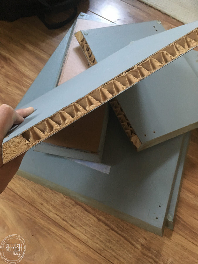 Inside of a laminate cabinet door. Replace old cabinet doors with new wood doors